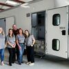 Excited SWODA staff welcomes its new mobile medical unit. From left: Kendra Gift, coalition coordinator; Cheryl Megli, coalition coordinator; Steve Berry, coalition coordinator; Carol Binghom, project director; and Samantha Cowan, patient navigator.
