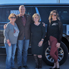Southern Kiowa Chamber member Sheila Treadwell (left) and President Candie Treadwell (right) before the annual Christmas Parade with Grand Marshal Gerrid Kendrix and wife Cynthia.